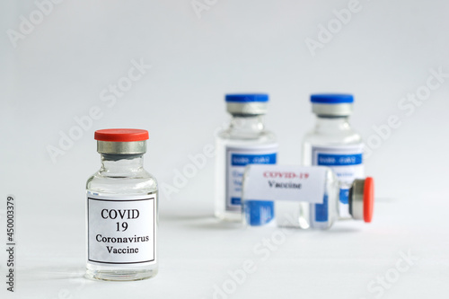 Vaccine bottle for immunization from coronavirus covid 19 epidemic on lab table with copy space, Concept with vaccine vial for Coronavirus, Sars, Covid 19 virus. 