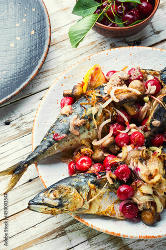 Grilled mackerel fish stuffed with cherries