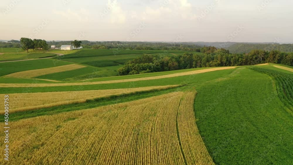 A drone aerial establishing shot of farmlands in rural Midwest America A drone aerial establishing shot of farmlands in rural Midwest America