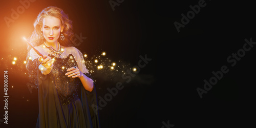 Fotografi black sorceress with magic wand