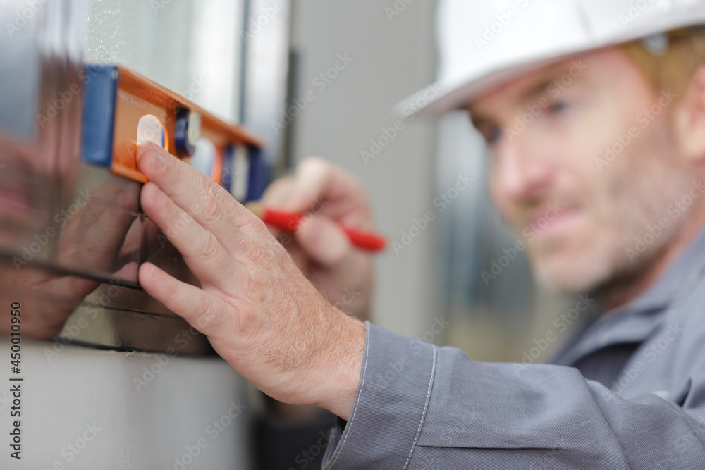 Obraz premium builder posing on construction site