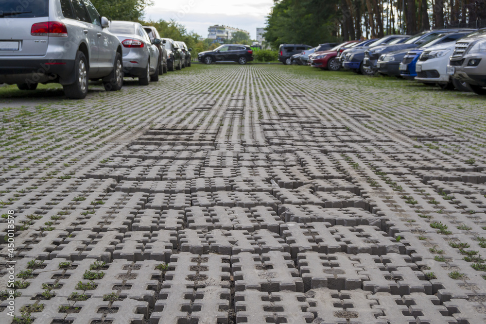 Obraz premium Broken coating in the parking lot. Not high-quality work of builders. Unprofessional approach to work