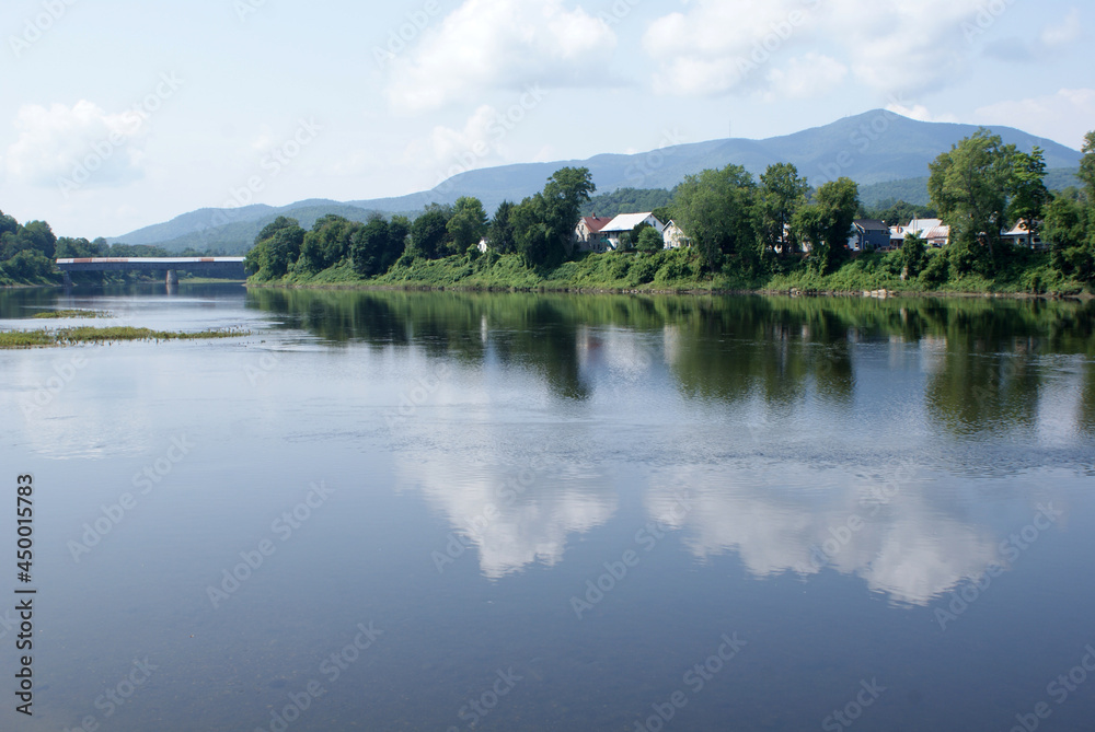 Reflection on the Connecticut River in Windsor Vt.