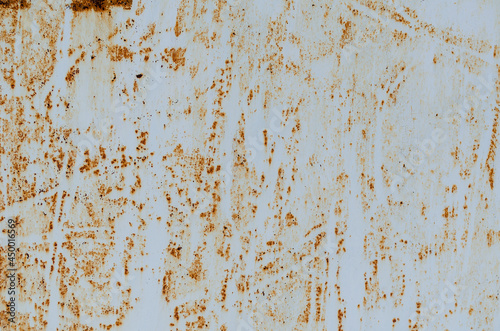 Rust stains. Rusted painted metal wall. Rusty metal background w