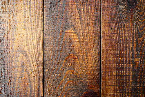 Foto Close-up of wooden surface in drops of water