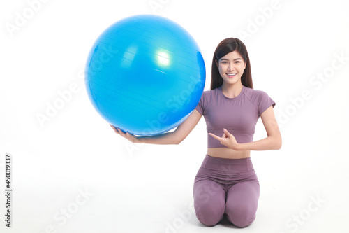 Healthy beautiful Asian woman Put on exercise clothes, play yoga ball. on a white background. weight loss exercise concept