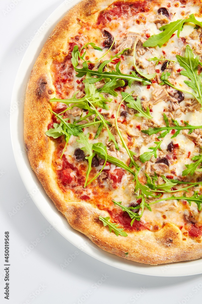 Pizza with Tuna, Olives and Arugula Top View Isolated