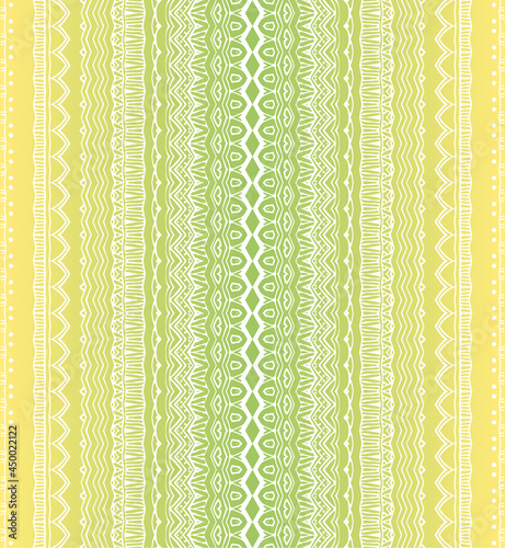 White vertical lace stripes on a yellow and green background. Wonderful seamless print for curtains. Retro style ornament. Vector.