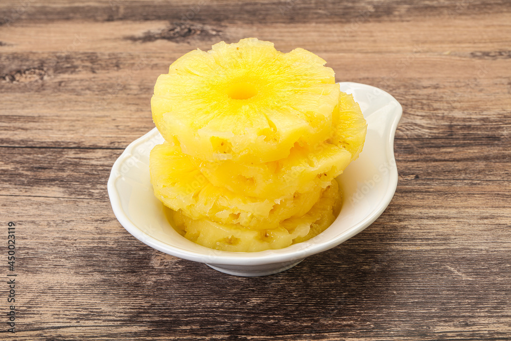 Sweet pineapple rings in the bowl Sweet pineapple rings in the bowl
