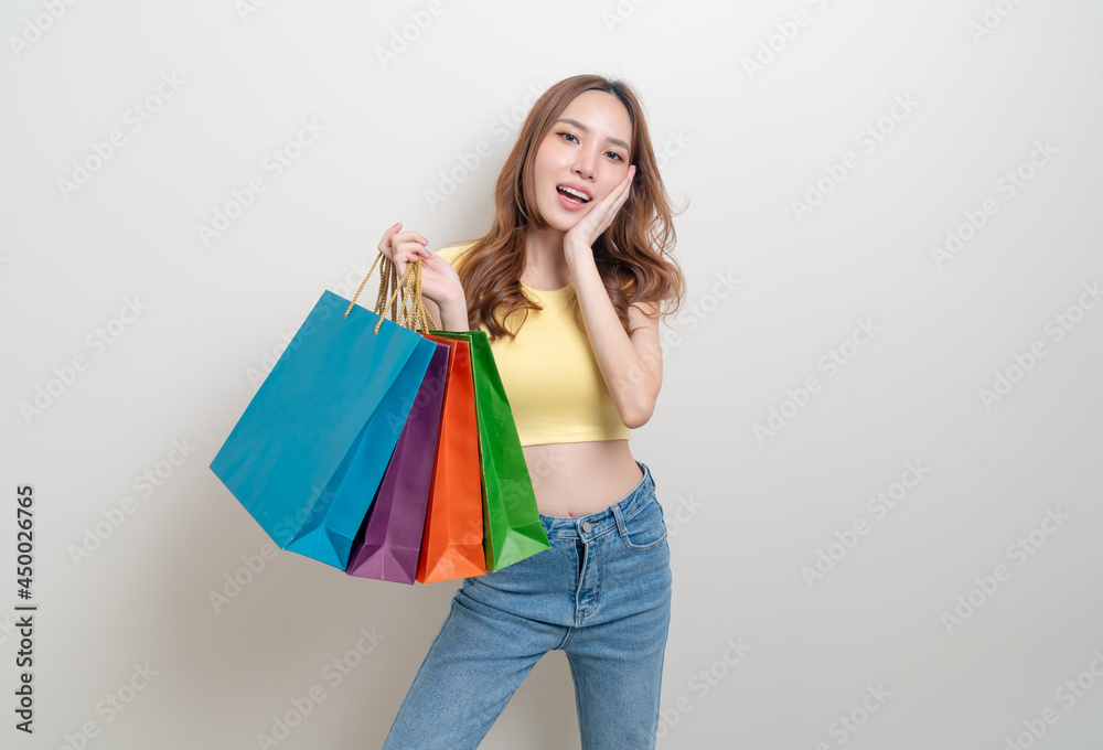 portrait beautiful Asian woman holding shopping bag portrait beautiful Asian woman holding shopping bag