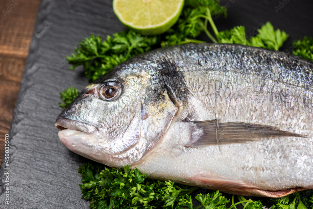 Sea bream and ingredients for cooking Sea bream and ingredients for cooking