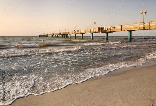 Fototapeta Naklejka Na Ścianę i Meble -  Sea bridge at Graal-Müritz, Mecklenburg-Vorpommern, Germany, on a summer evening