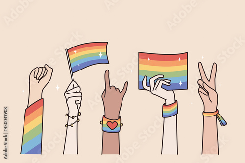 LGBT Pride Month holiday concept. Human hands gesturing waving with lgbt rainbow and transgender flag during parade vector illustration