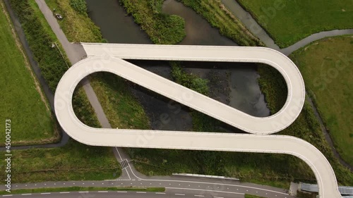 Pedestrian and cyclist bridge over the Amsterdams Rijn Canal,  waterway in Nigtevecht The Netherlands. Liniebrug photo