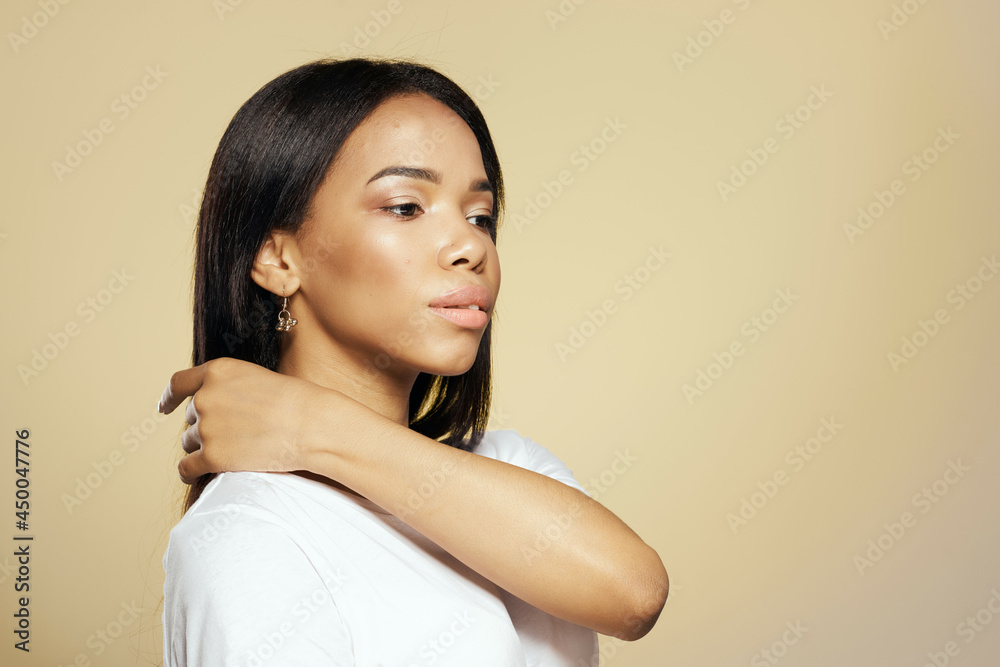 cute african woman in white t-shirt long hair posing close up cute african woman in white t-shirt long hair posing close up