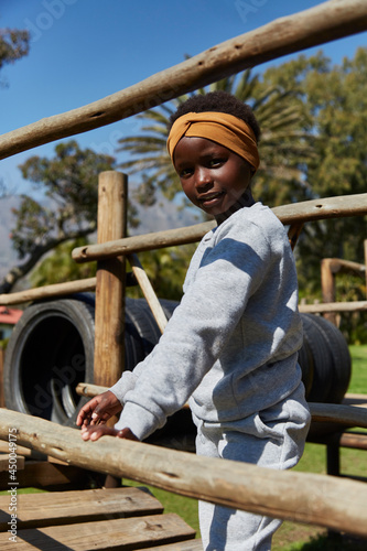 pretty young black girl at park