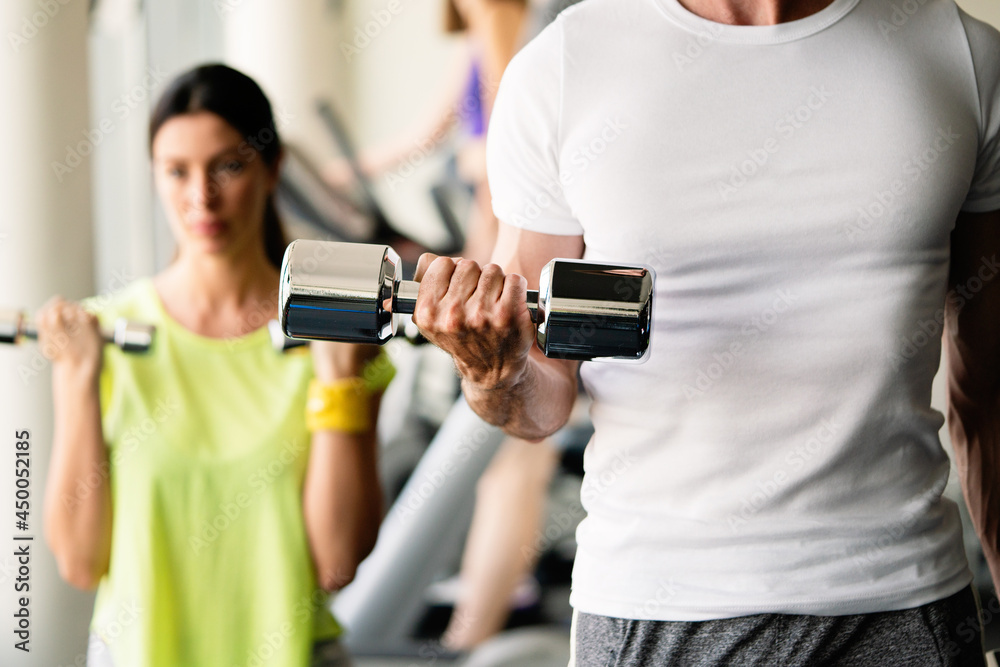 Group of people training in gym together Group of people training in gym together