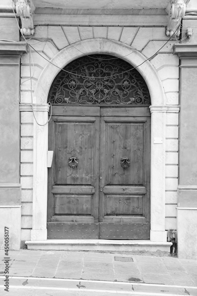 Door in Massa, Tuscany. Italy black white.