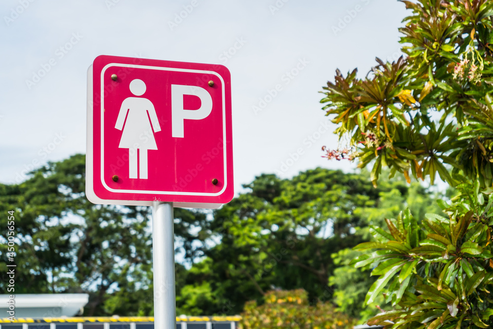 Pink signpost of parking lot for female Pink signpost of parking lot for female