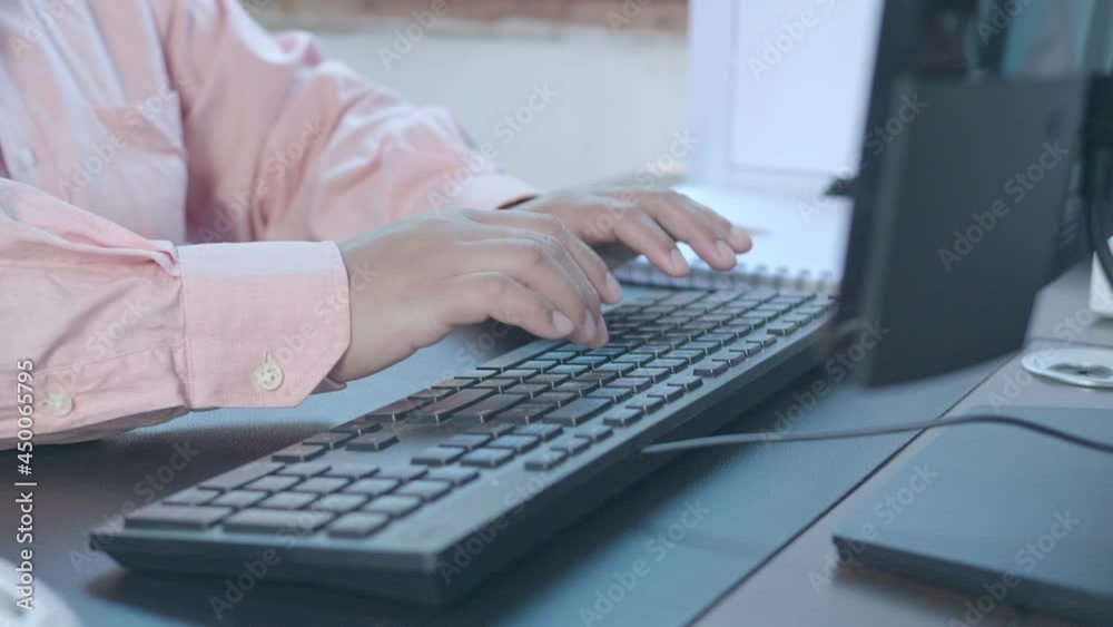 4k. slow motion of camera slide close up female hands of business woman using typing on keyboard computer pc at home office desk. Freelancer working online with pc. Marketing and financial concept. 4k. slow motion of camera slide close up female hands of business woman using typing on keyboard computer pc at home office desk. Freelancer working online with pc. Marketing and financial concept.