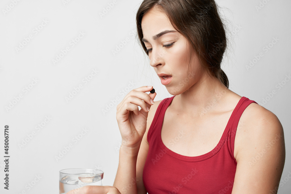woman in red t shirt medicine health problems lifestyle woman in red t shirt medicine health problems lifestyle
