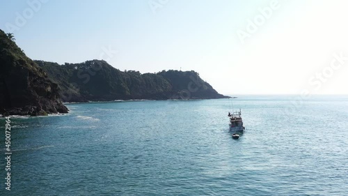 Aerial view of small fishing boat at brava beach, Itajaí, Brazil