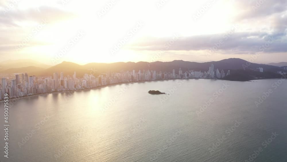 Aerial view of Balneário Camboriú cityescape during sunset, Brazil.