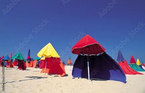 colorful umbrellas on the beach © katsuhiko kato