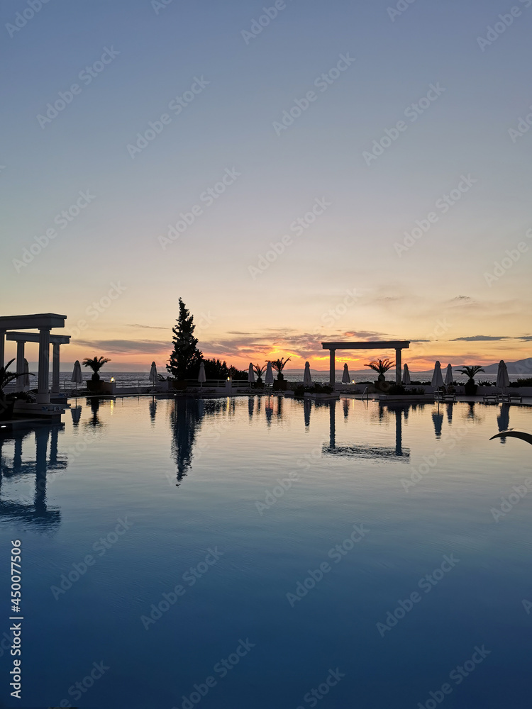 Beautiful sunset over the empty pool and the sea. The Aegean sea. Turkey, Kusadasi.