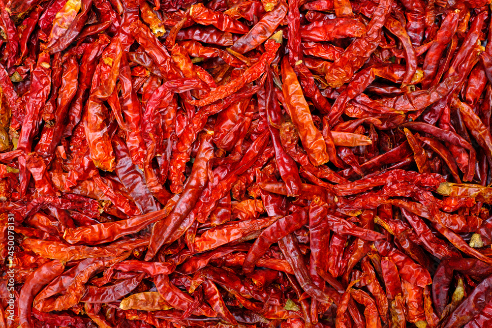 Dried red chili goat peppers background