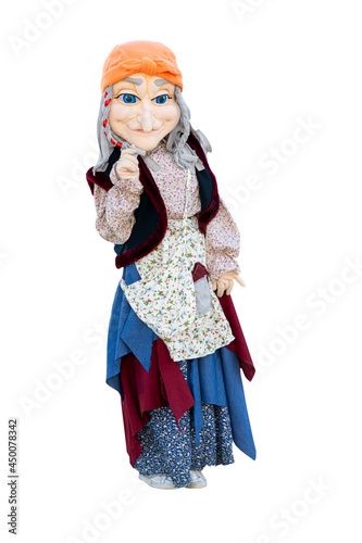 Life-size doll, fairy-tale character witch, Baba Yaga, isolated on a white background