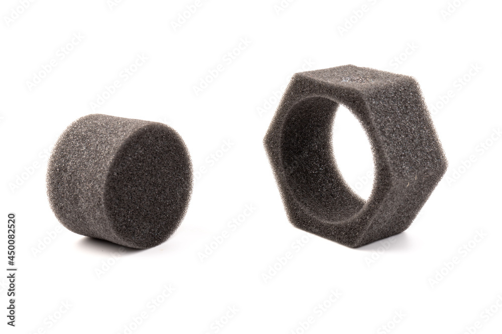 piece of foam rubber on white background. Black sponge piece of foam rubber on white background. Black sponge