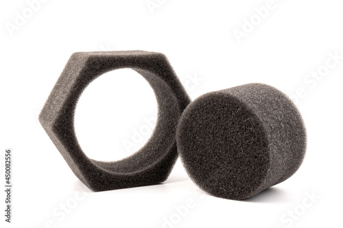 piece of foam rubber on white background. Black sponge