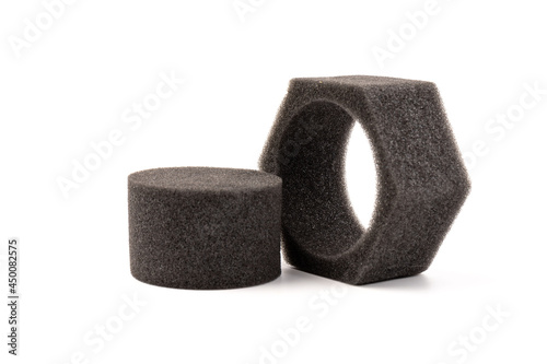 piece of foam rubber on white background. Black sponge