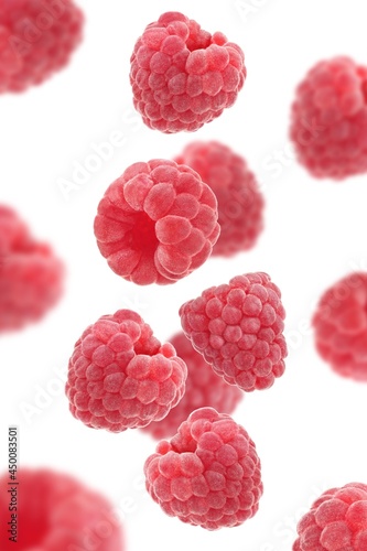 Falling raspberry isolated on white