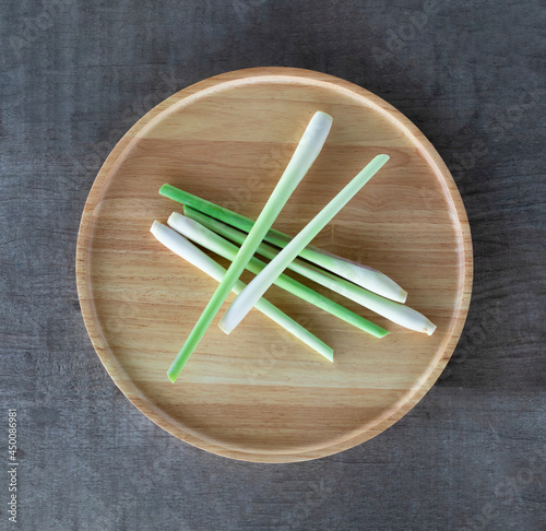 fresh lemongrass on a wooden tray