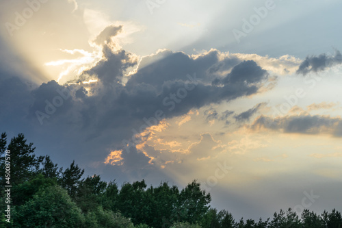 Kuivastu Estonia - June 22 2021: Dramatic dawn. Nordic white nights. Sunset on the Baltic Sea, Western coast of Estonia. Reflections of the colors on the water. Midsummer in the North.