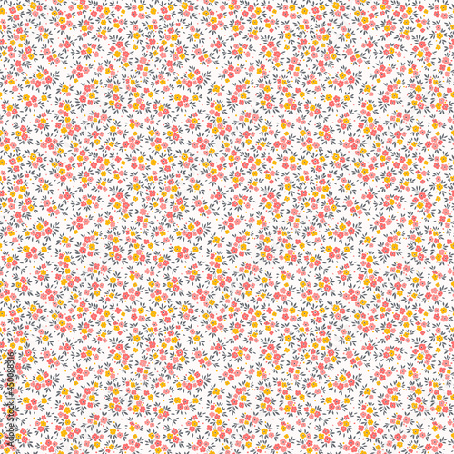 Cute floral pattern in the small flowers. Seamless vector texture. Elegant template for fashion prints. Printing with small pink and yellow flowers. White background.