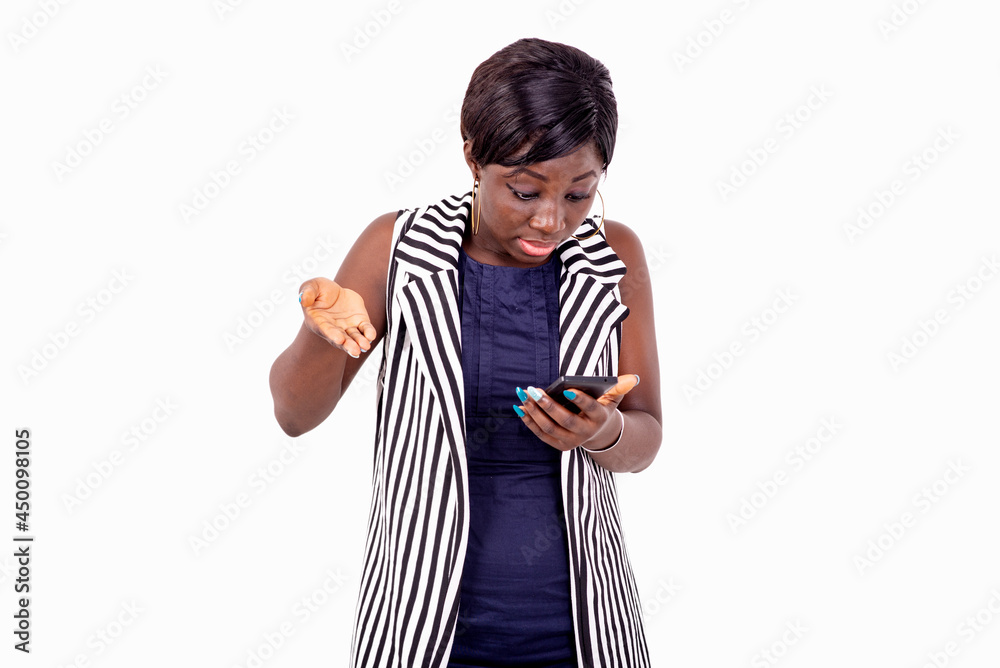 beautiful surprised young woman seeing bad news on mobile phone. beautiful surprised young woman seeing bad news on mobile phone.