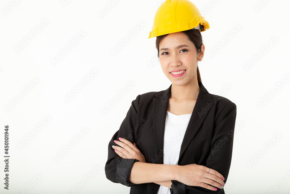 Portrait young attractive Engineer, entrepreneur or architect business woman smiling and wearing yellow hard hat and black formal uniform isolated on white background in studio. Portrait young attractive Engineer, entrepreneur or architect business woman smiling and wearing yellow hard hat and black formal uniform isolated on white background in studio.
