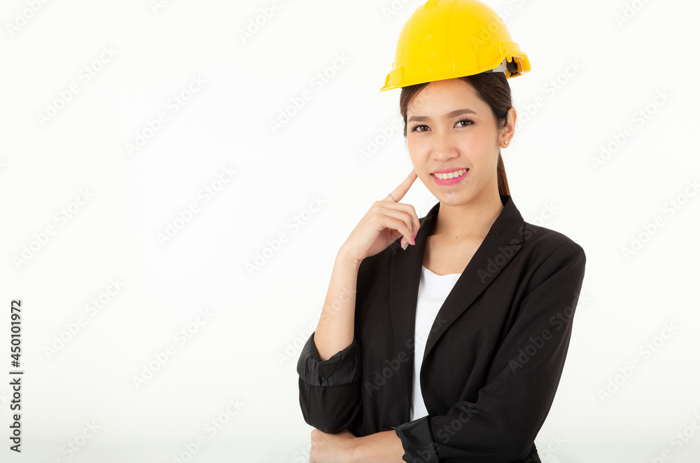 Portrait young attractive Engineer, entrepreneur or architect business woman smiling and wearing yellow hard hat with white background copy space at studio. Pretty asia female confident Pretty lady. Portrait young attractive Engineer, entrepreneur or architect business woman smiling and wearing yellow hard hat with white background copy space at studio. Pretty asia female confident Pretty lady.