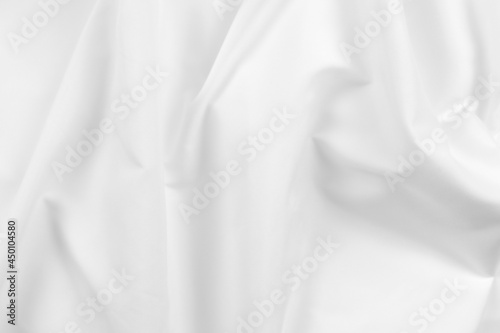 Abstract white fabric texture background. Cloth soft wave. Creases of satin  silk  and cotton.