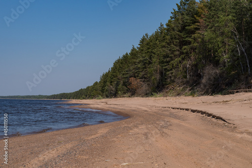 Fototapeta Naklejka Na Ścianę i Meble -  Sandy beach on the southern shore of Lake Ladoga, Leningrad region of Russia, near the village of Chernoe.