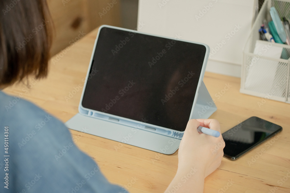 closeup woman hand use tablet meeting and working from home closeup woman hand use tablet meeting and working from home