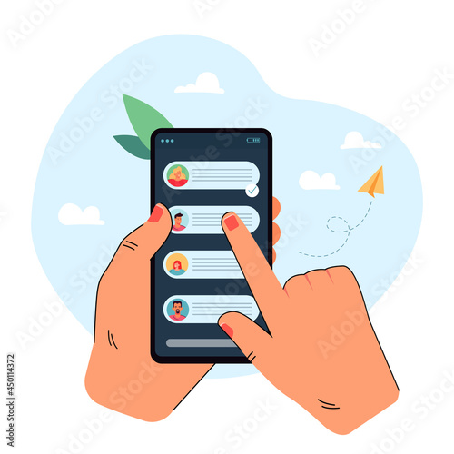 Hand holding mobile phone with chat messages on screen. Finger tapping telephone screen flat vector illustration. Texting with friends online. Smartphone, conversation concept