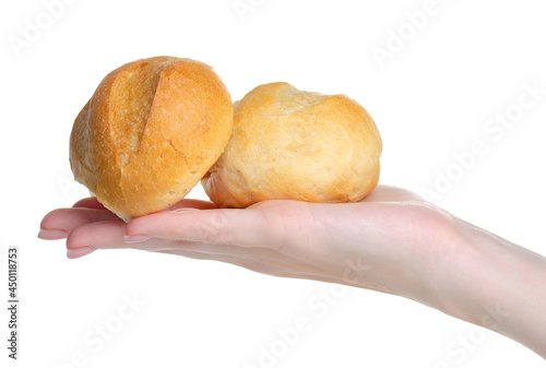 Fresh bun loaf bread in hand on white background isolation