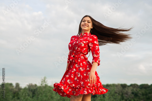 portrait of a beautiful young woman in summer 
