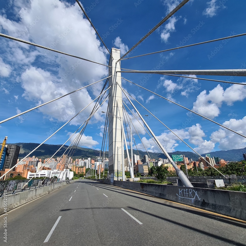 4 South avenue bridge and mountains and blue sky. Medellin, Antioquia, Colombia. 