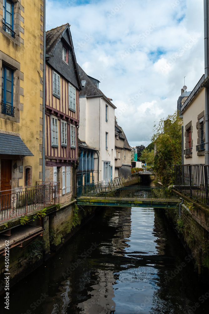 Traditional wooden houses by the river in the medieval town of Quimper in the department of Finisterre. French Brittany, France