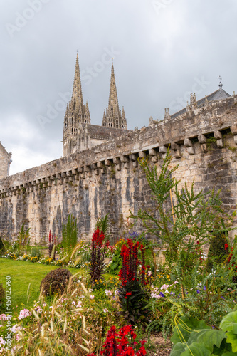 Walls of the medieval village of Quimper and the cathedral of Saint Corentin, department of Finisterre. French Brittany, France photo